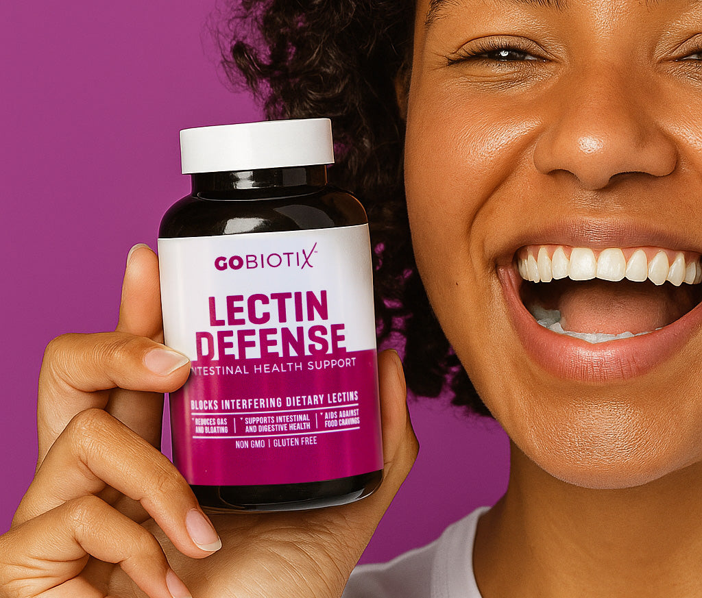 Person holding a bottle of GoBiotix Lectin Defense supplement with a purple background